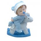 Figurine sujet bébé garçon sur cheval à bascule
